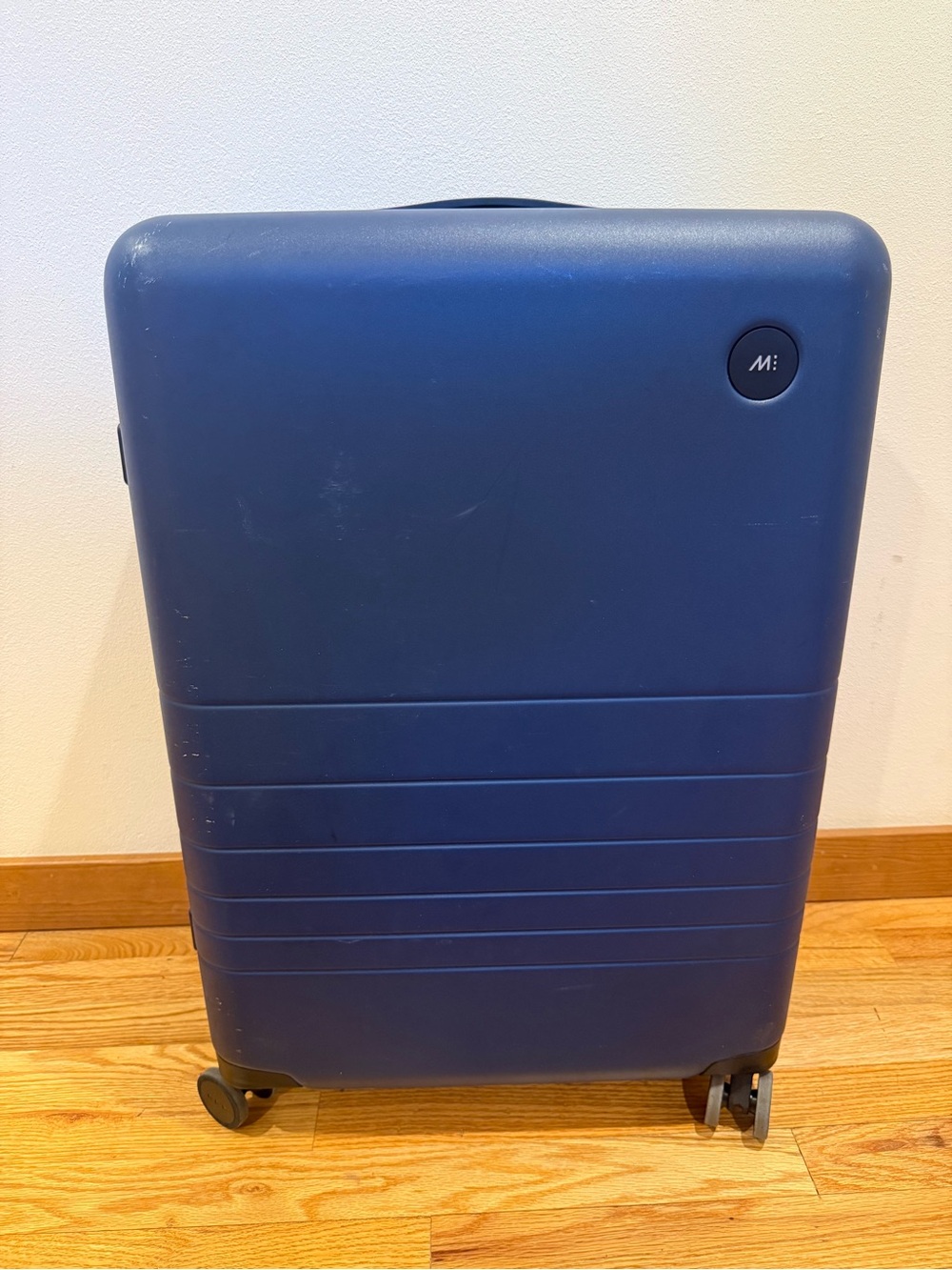 26" MONOS Check In Medium Hard Shell Checked Luggage Rolling Suitcase Blue